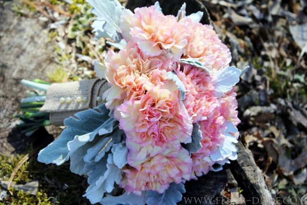 This bouquet contains Pink Carnations with a touch of Yellow and Dusty 